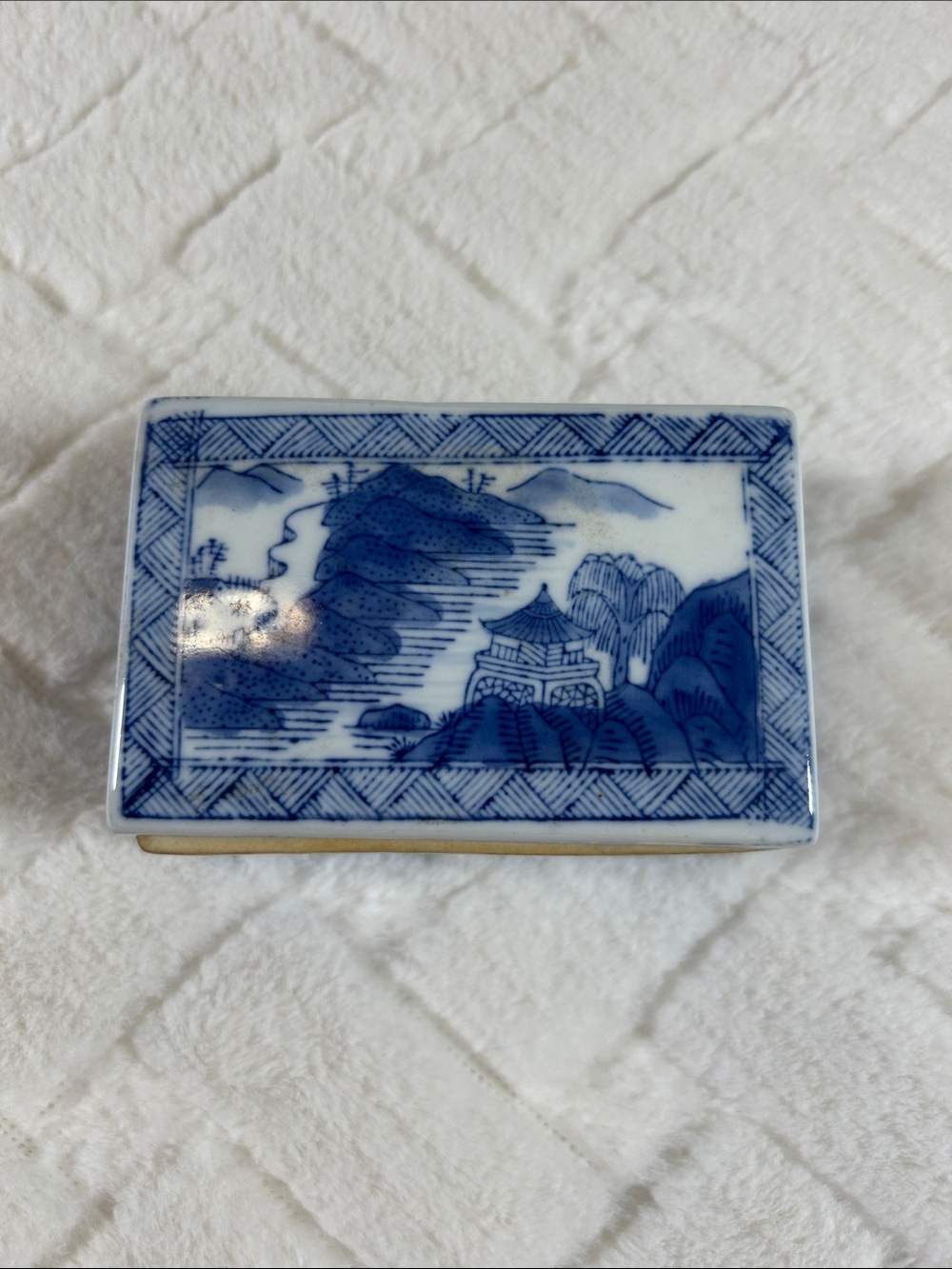 Vintage Chinese hand-painted porcelain lidded box with blue and white landscape